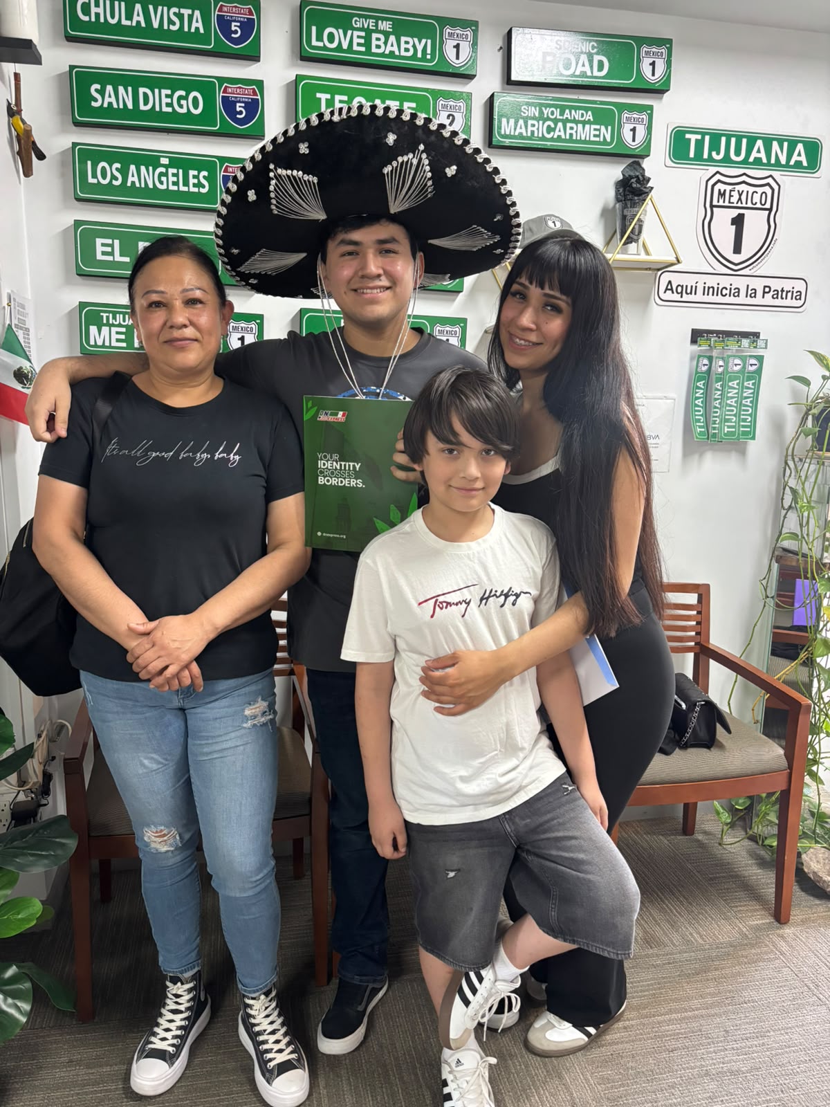 Mexican-American family celebrates getting Mexican dual citizenship at DNExpress Tijuana office during Hispanic Heritage Month